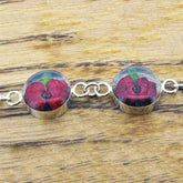 Silver link bracelet with real poppy flowers